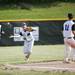 Pioneer senior Tom Hadlock juggles a dropped ball during a double header against Saline on Monday, May 20. Daniel Brenner I AnnArbor.com